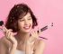 short-hair-asian-young-beautiful-woman-applying-cosmetic-powder-brush_1_11zon